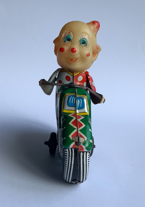 1960s Japanese Haji Tinplate traction clown toy